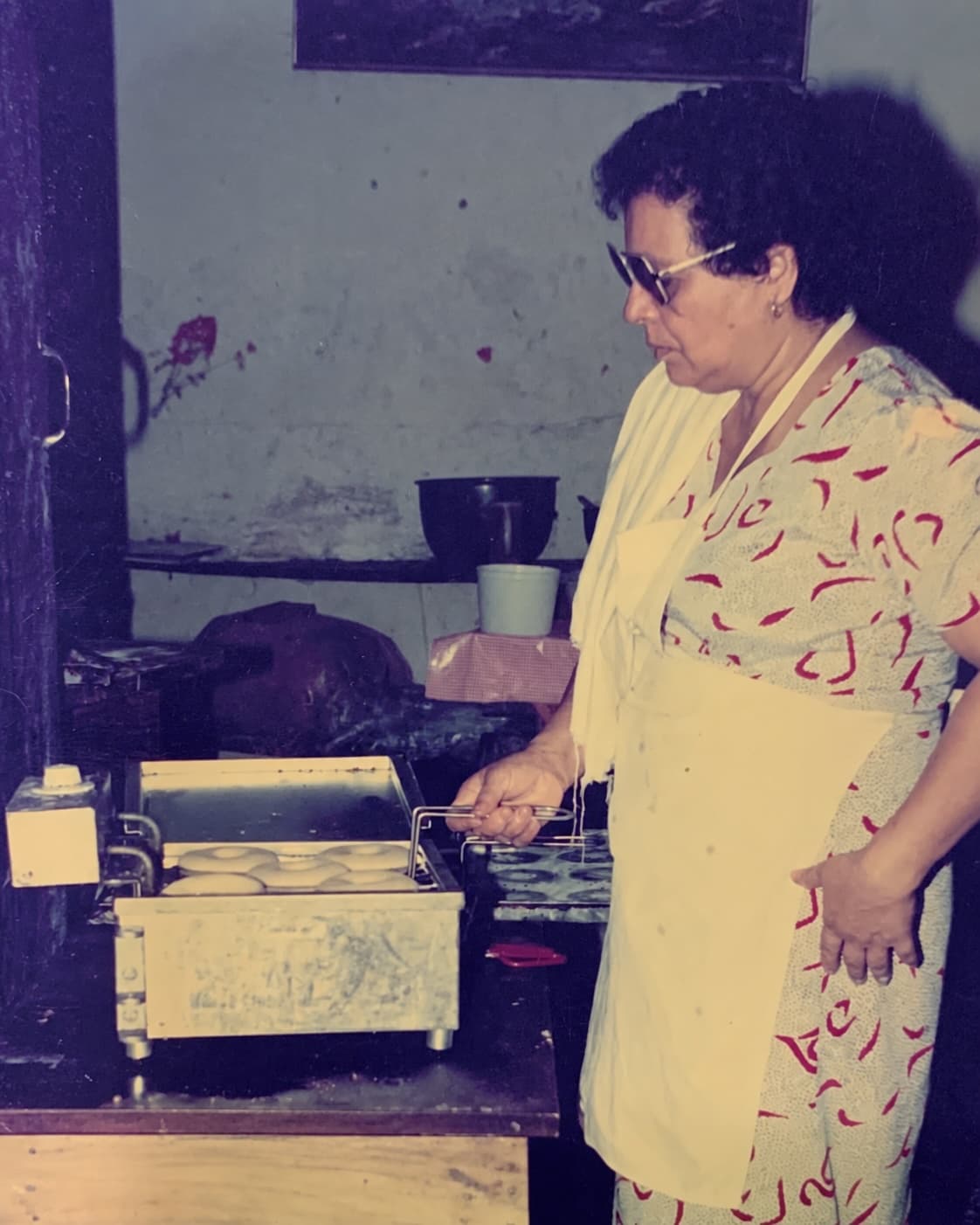 Margarita Cristina de Rodriguez Angulo baking in her kitchen in San Miguel